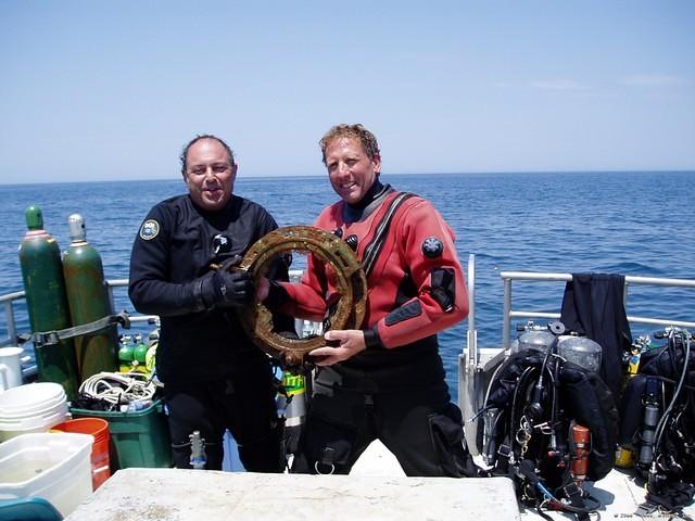 Mark and Wes with the porthole they recovered.