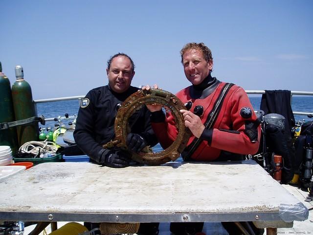 Mark and Wes with the porthole that they recovered.